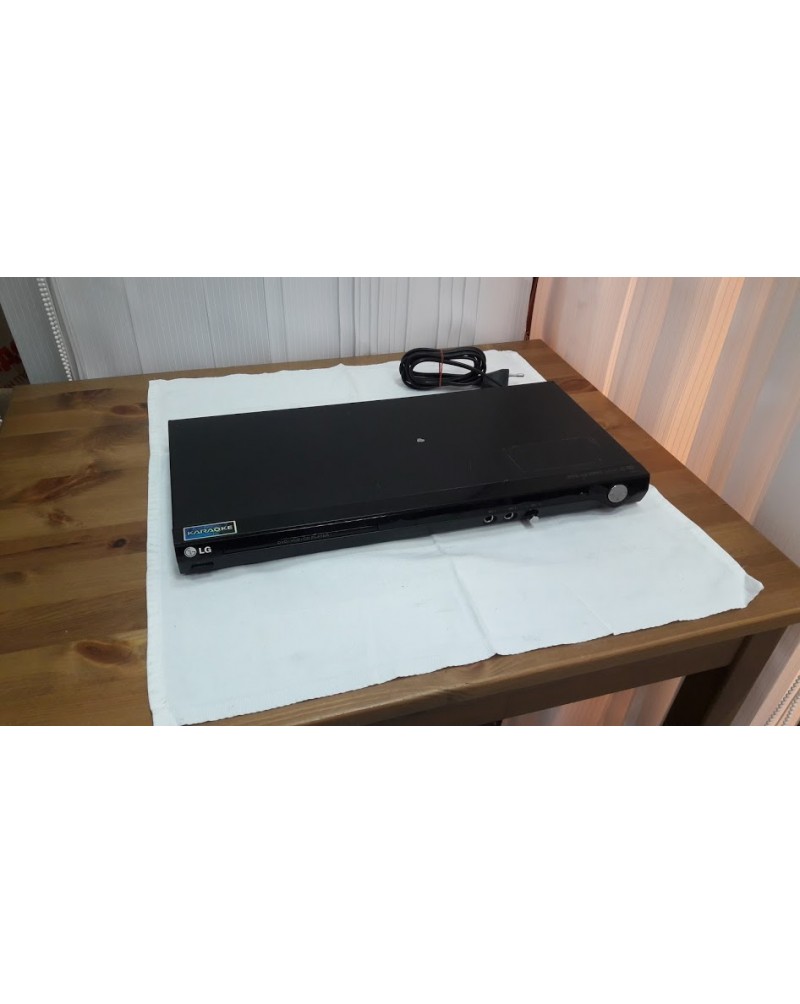 Плеер КАРАОКЕ LG DVD model DK768 +пульт